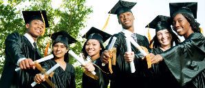 group of graduates with diplomas